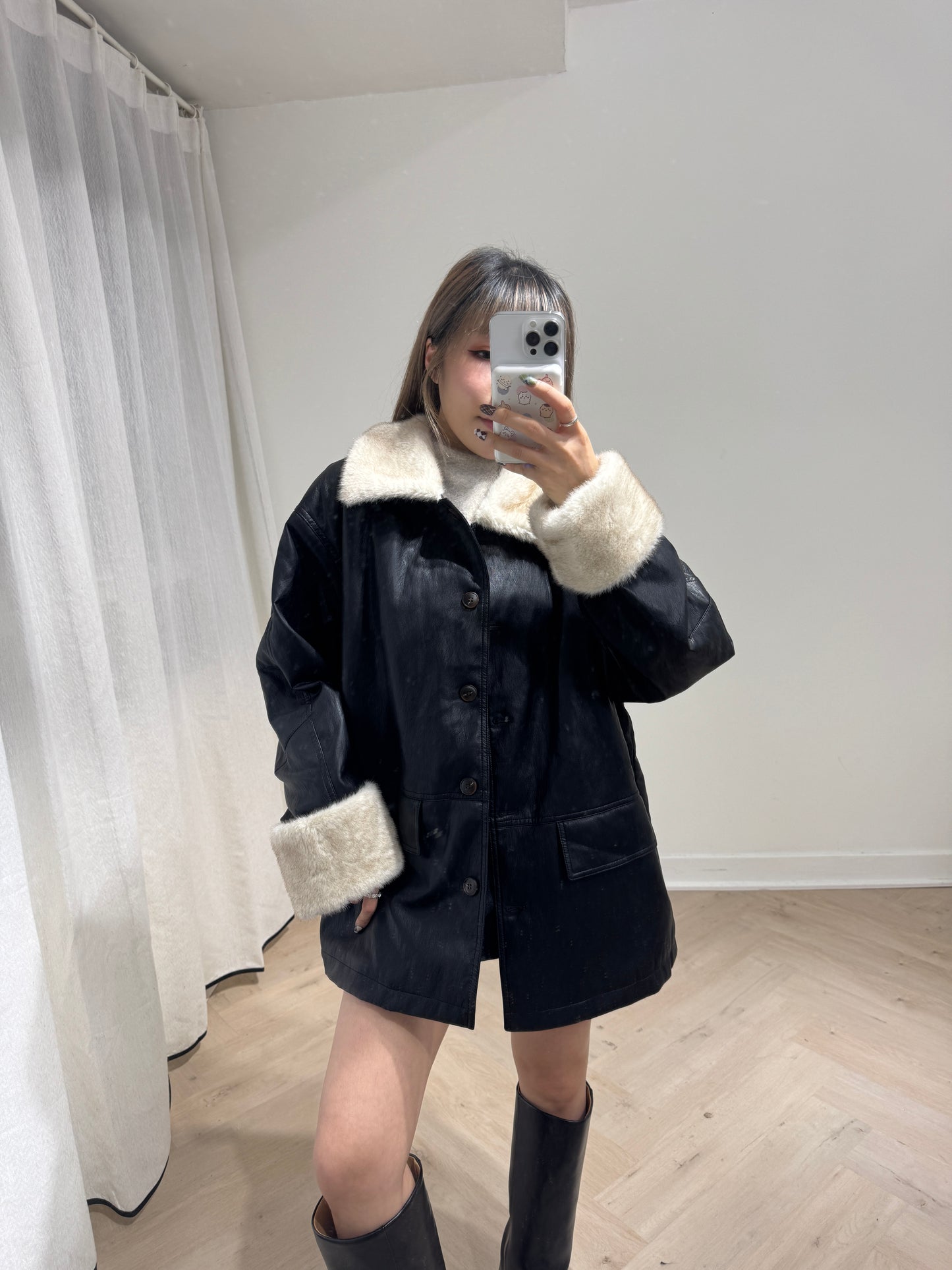 併毛毛黑色仿皮外套