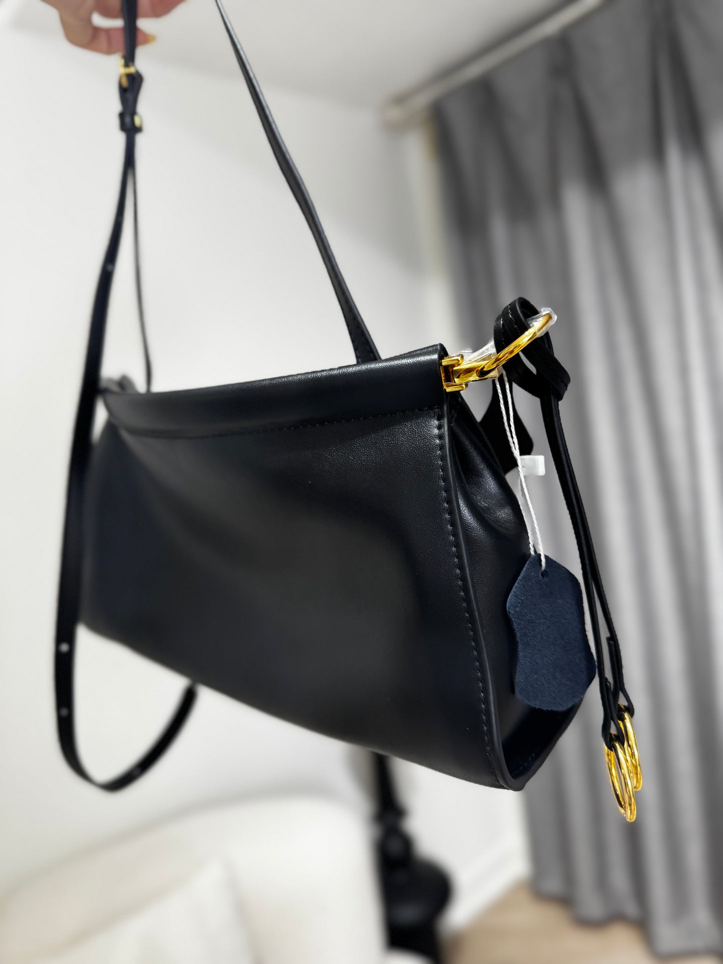 黑色扁形真皮手袋